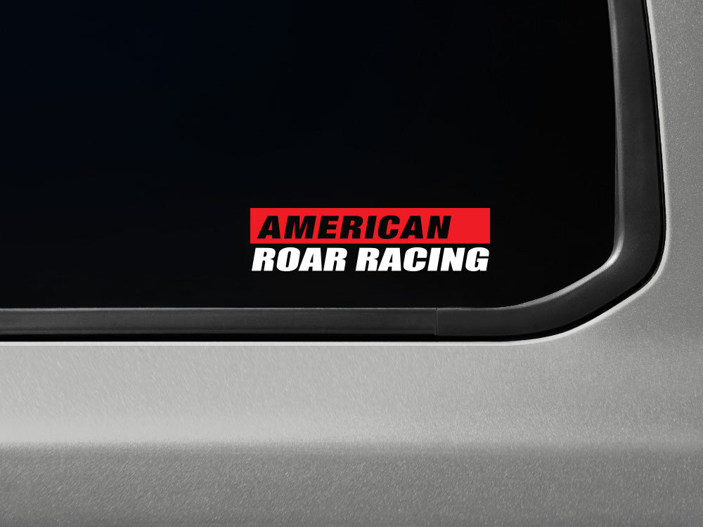 American Roar Racing decal with a transparent background, featuring bold red and white text, designed for vehicle windows.