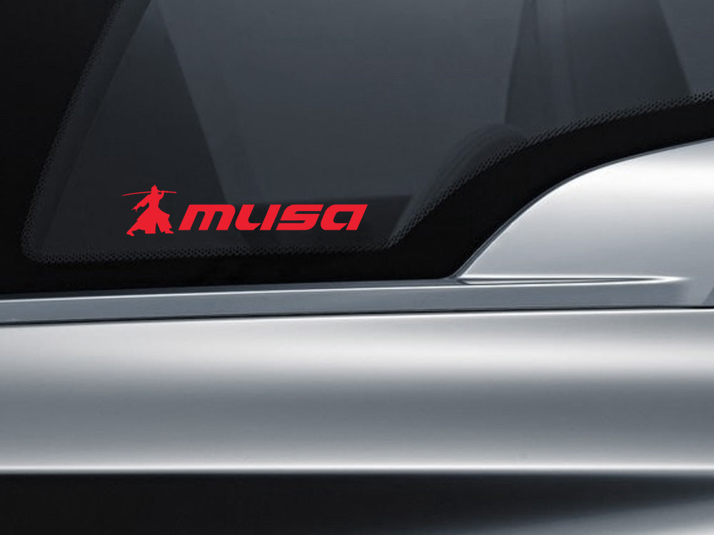MUSA decal with a transparent background displayed on a car window, featuring bold red lettering.