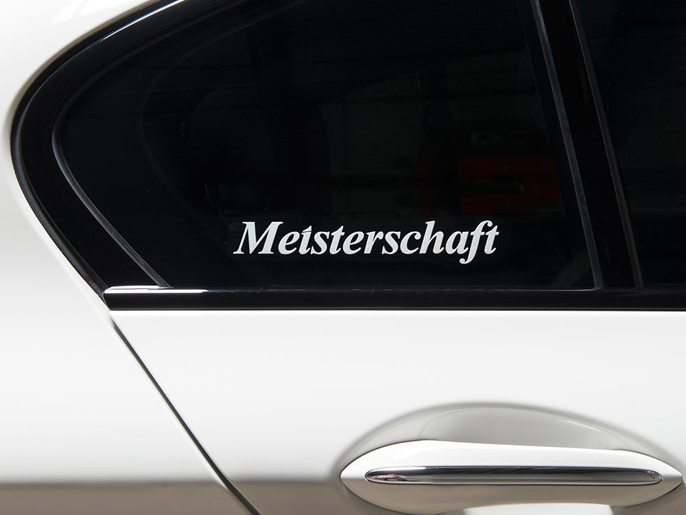 Meisterschaft decal with a transparent background, designed for car windows, showcasing brand identity.