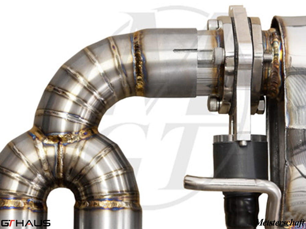 Close-up of a premium exhaust system for Audi TT MK II 2.0T Quattro, showcasing high-quality stainless steel welds and components.