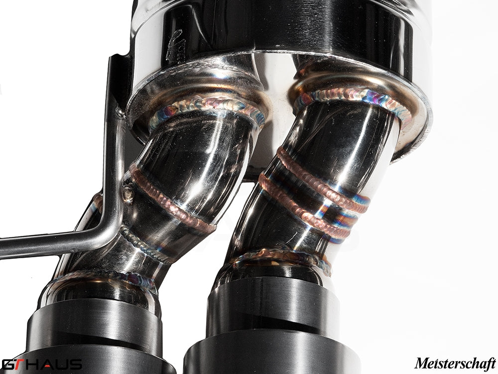 Close-up of Meisterschaft exhaust system featuring polished stainless steel welds for BMW E36/7, E36/8 Z3M 3.2L models.