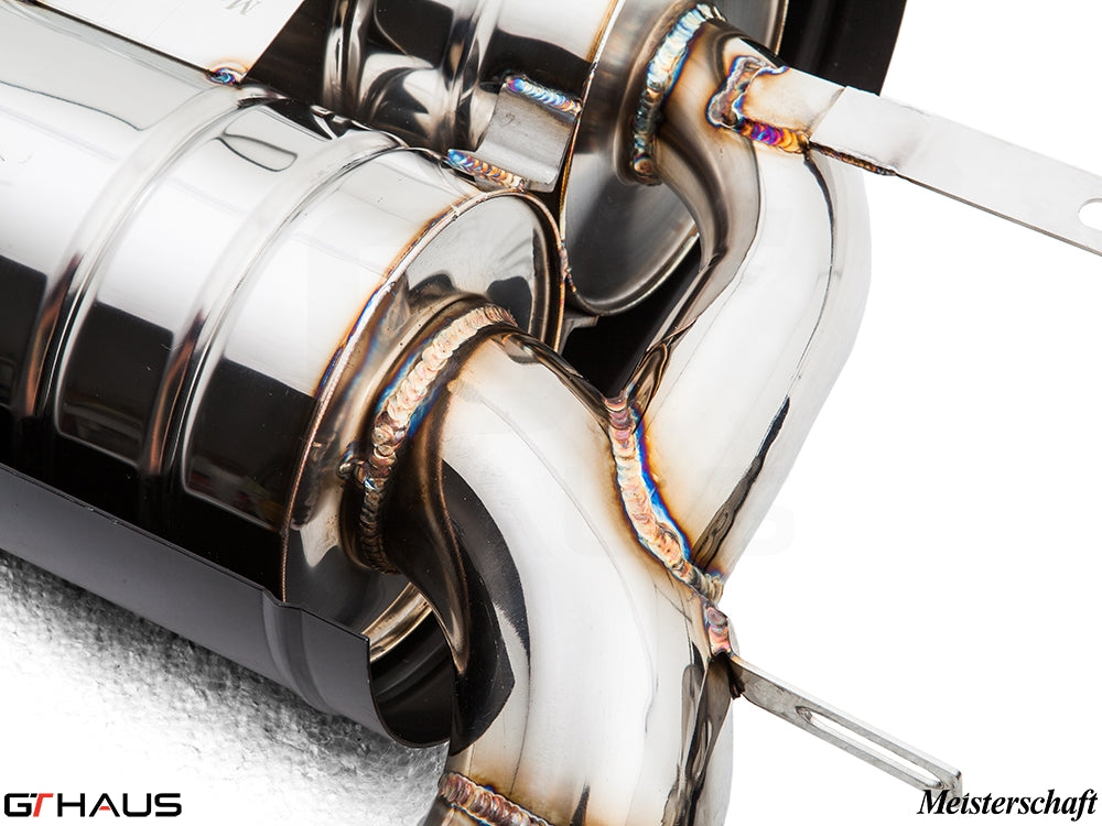 Close-up of a polished exhaust system for BMW E71 X6 SAV Sport 5.0i, showcasing detailed welding and craftsmanship.