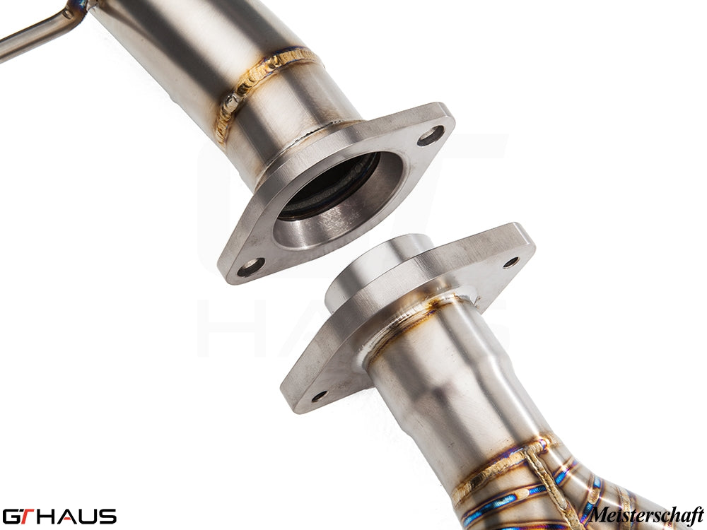Premium performance exhaust system components for BMW E82/88 1 Series 1M, showcasing stainless steel craftsmanship.
