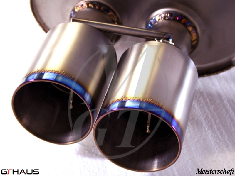 Premium exhaust tips for BMW E85/86 Z4M featuring a polished finish and vibrant blue accents, designed for performance.