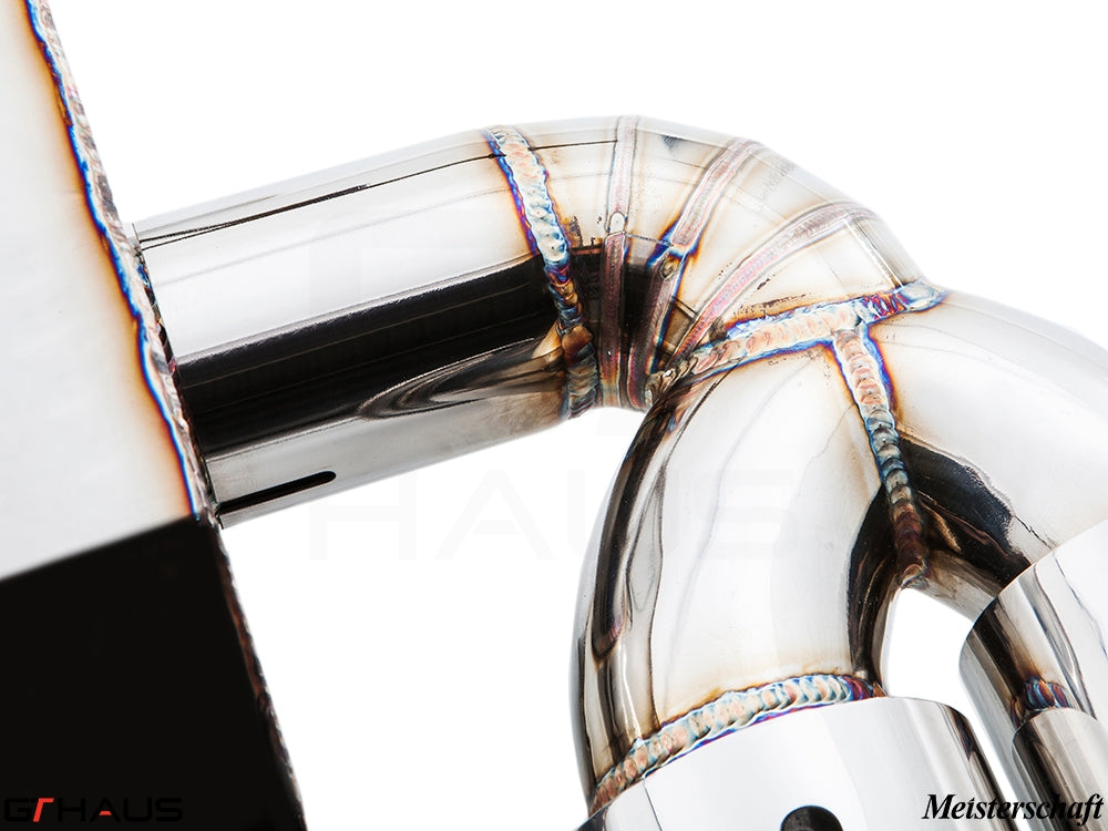 Close-up of a premium stainless steel exhaust pipe featuring precision welds, designed for BMW F32/F33 4 Series models.