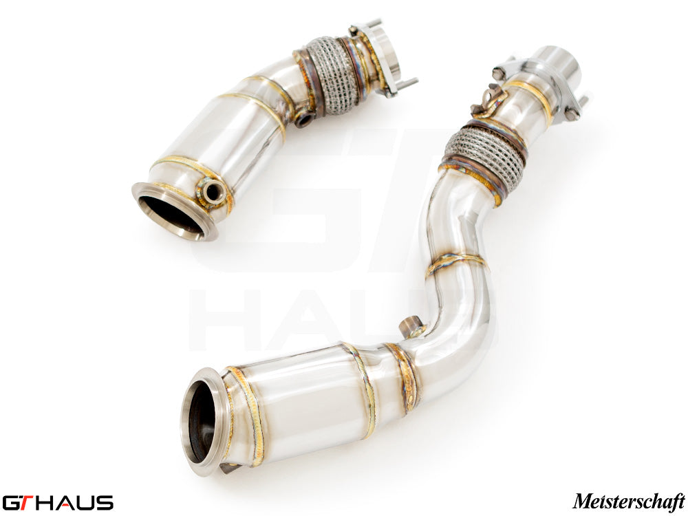 Premium BMW F80/82/83 M3/M4 down pipes with 400 CEL sport cats and 90mm piping for enhanced performance.