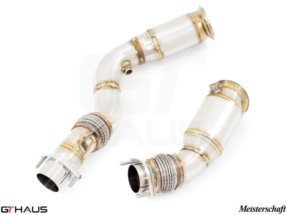 BMW F80/82/83 M3/M4 2014-2020 down pipes with 400 CEL sport cats and 90mm piping for enhanced performance.