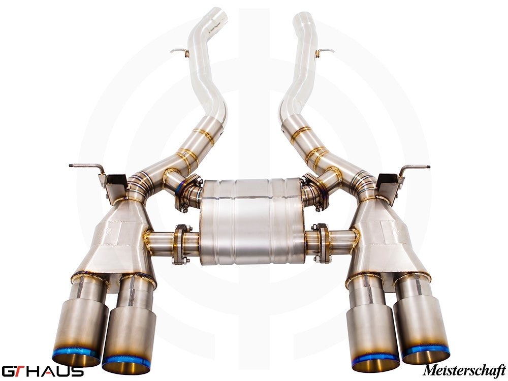 Premium performance exhaust system for BMW F80/82/83 M3/M4, featuring stainless steel construction and quad tips.