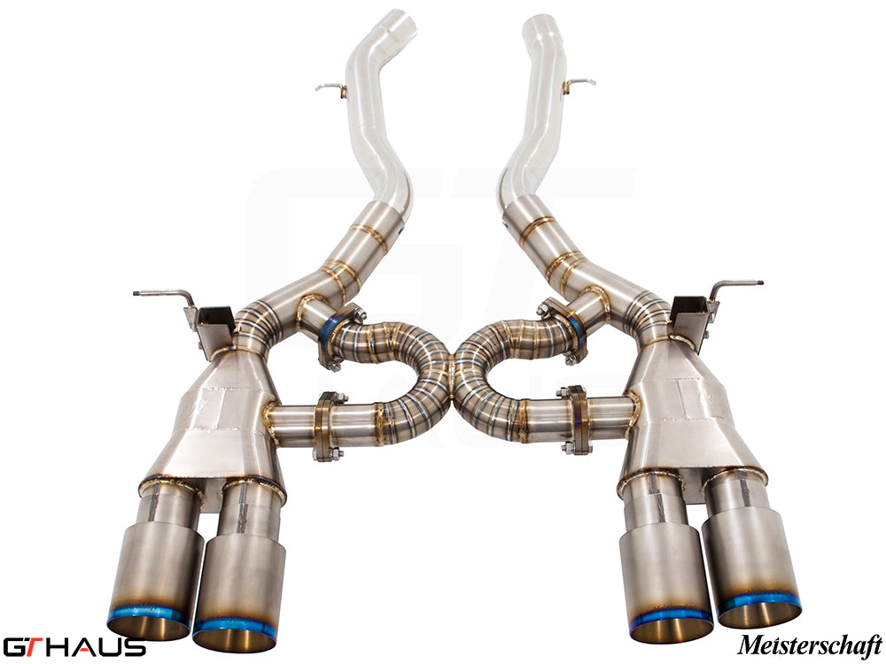 Premium performance exhaust system for BMW F80/82/83 M3/M4, featuring stainless steel construction and dual tips.
