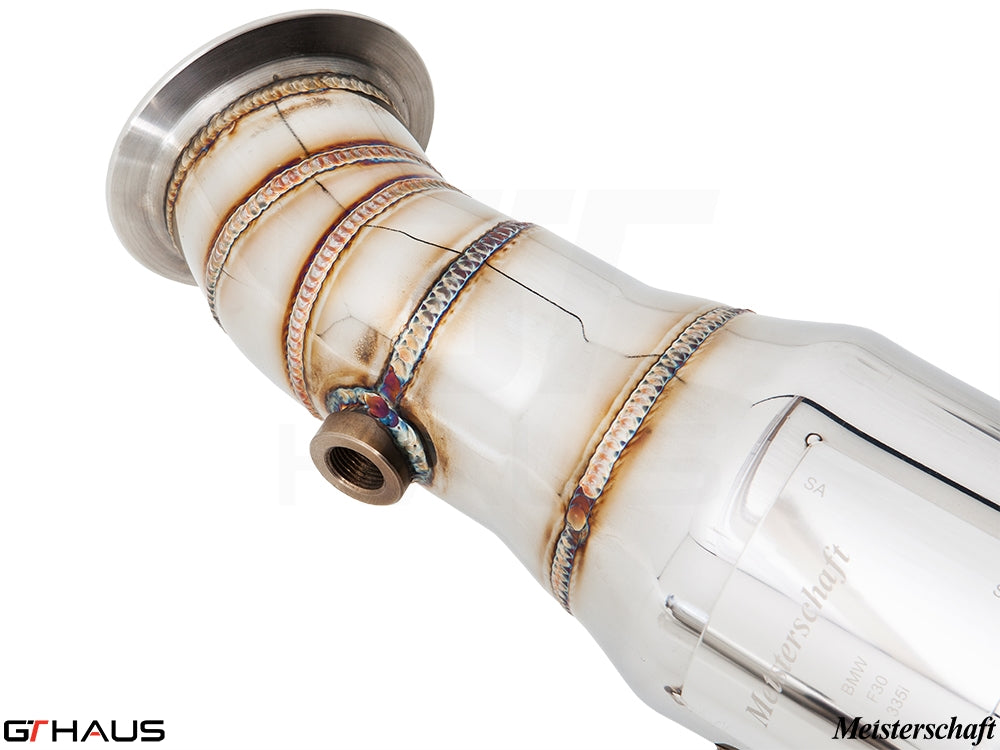 High-performance down pipe for BMW F87 M2 models featuring 400 CEL sport cats, designed for enhanced exhaust flow.