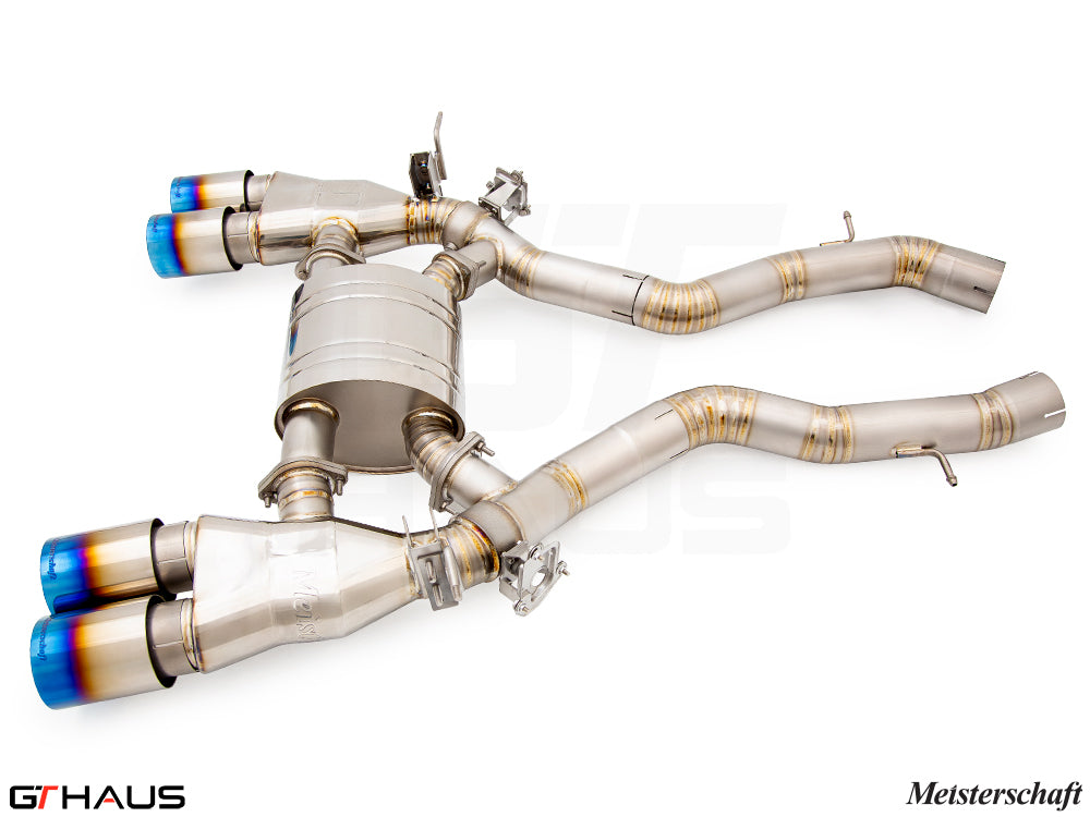 Premium performance exhaust system for BMW F87 M2, M2 Competition, and M2 CS, featuring stainless steel construction and blue-tipped tips.
