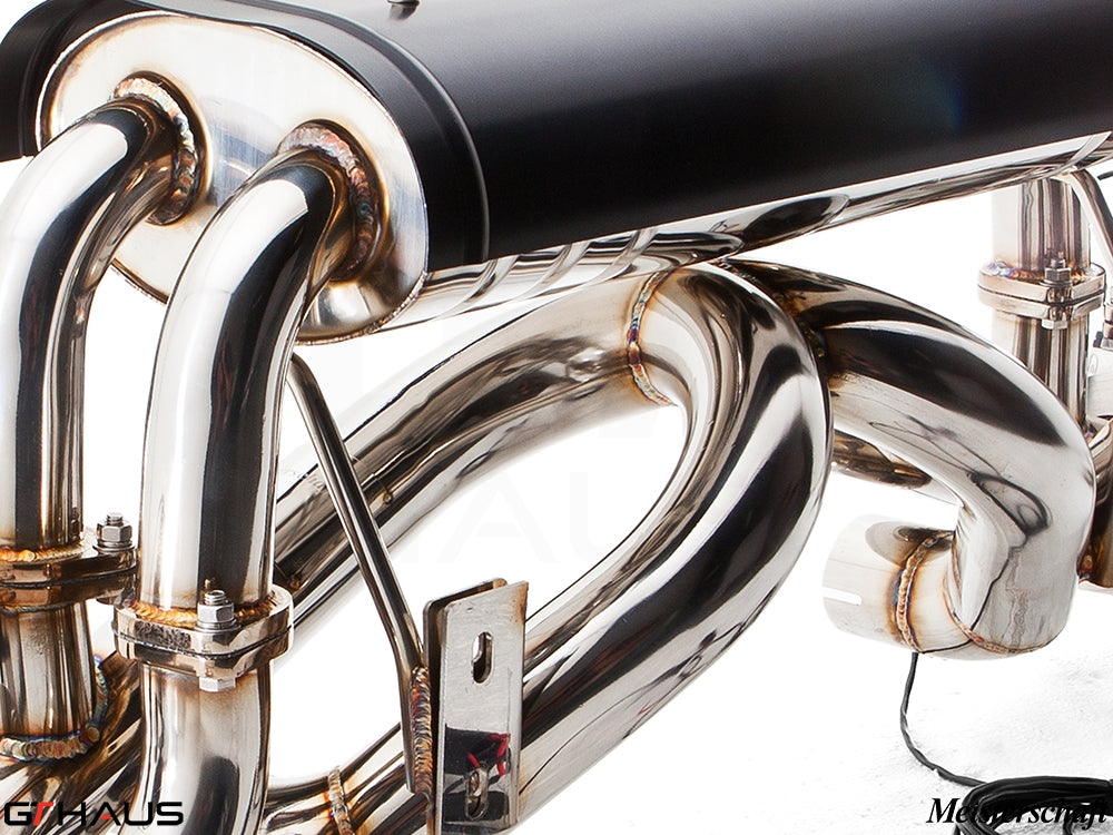 Premium stainless steel exhaust system for Ferrari F430 Coupe/Spider, showcasing intricate piping and craftsmanship.