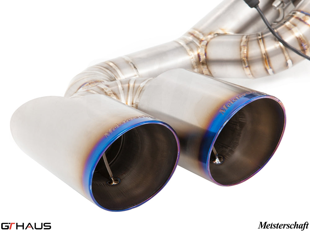 Premium exhaust tips for Ferrari F430 Coupe/Spider, featuring a polished finish and Meisterschaft branding.