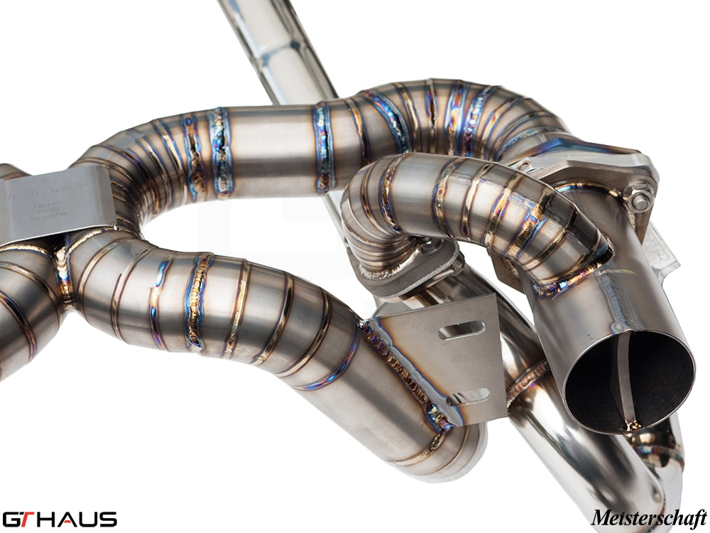Premium stainless steel exhaust system for Ferrari F430 Scuderia, showcasing intricate welds and performance design.