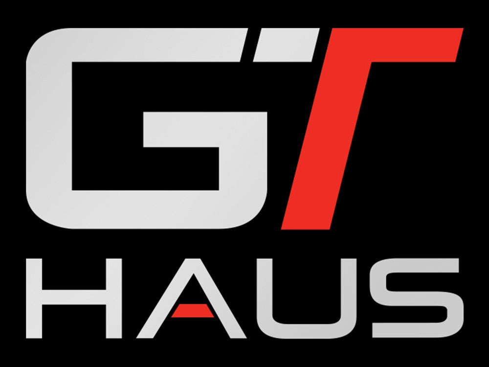 GTHAUS decal featuring a bold logo with "GT" in gray and red, and "HAUS" in gray, on a transparent background.