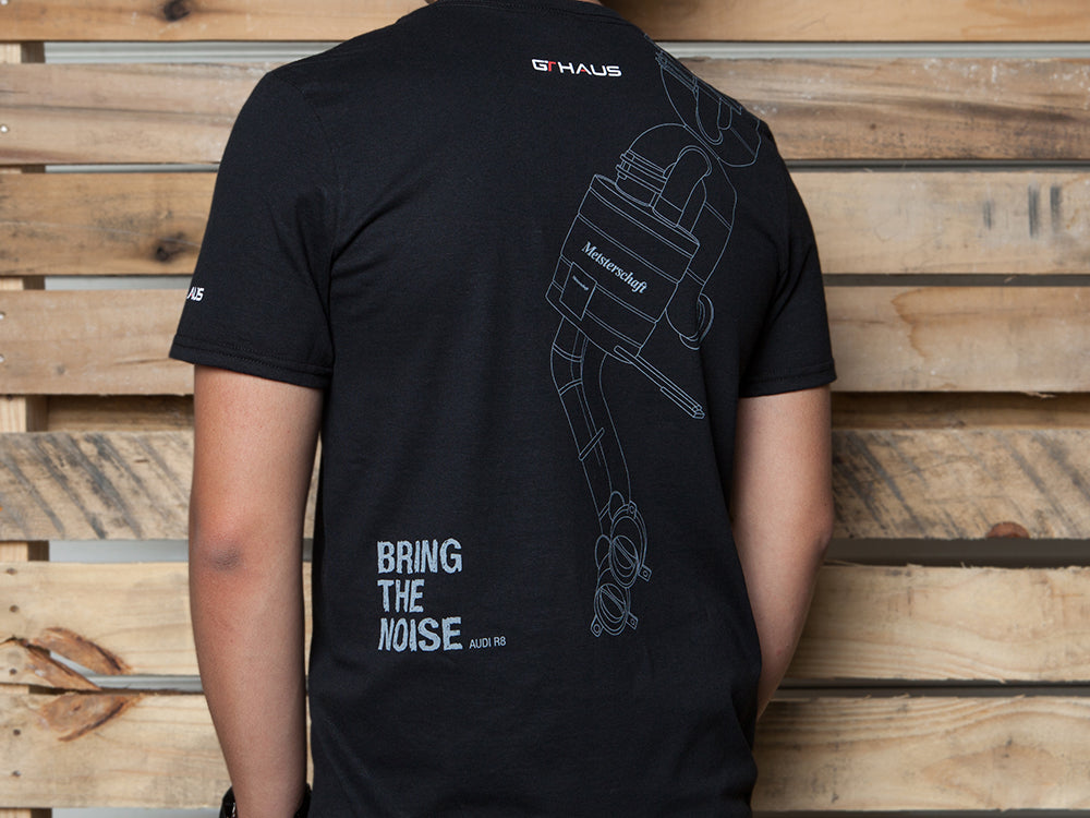 Black MEISTERSCHAFT T-shirt featuring an Audi R8 exhaust design and "Bring the Noise" text on the back.