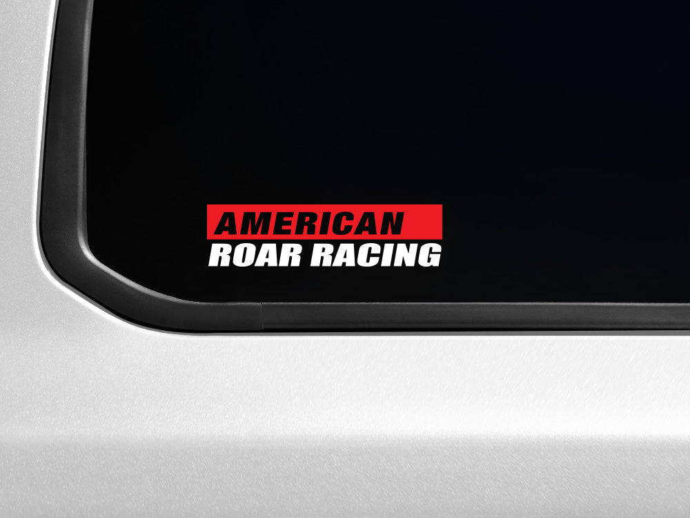American Roar Racing decal with a transparent background, featuring bold red and black text on a vehicle window.