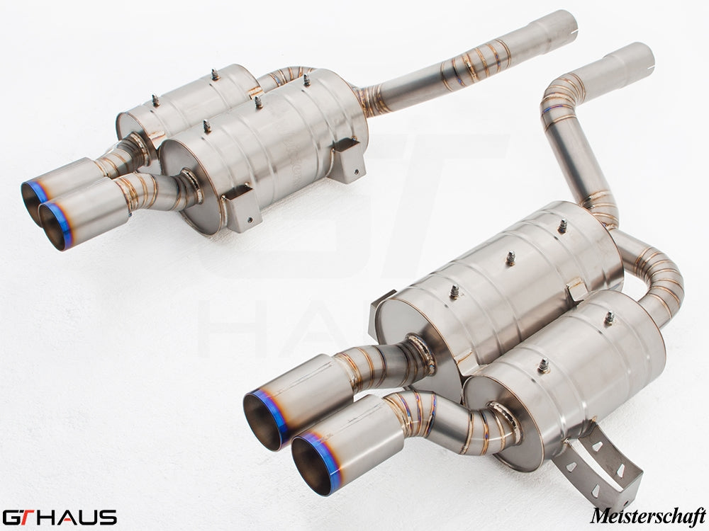 Premium stainless steel exhaust system for BMW E39 M5 V8 Sport Sedan, featuring dual tips and Meisterschaft branding.