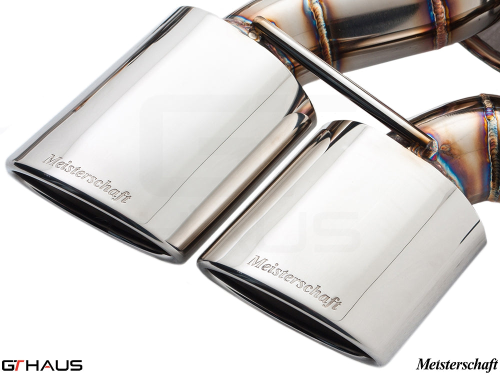 Premium Meisterschaft exhaust tips for BMW E63/64 M6 V10, showcasing polished stainless steel finish and brand engraving.