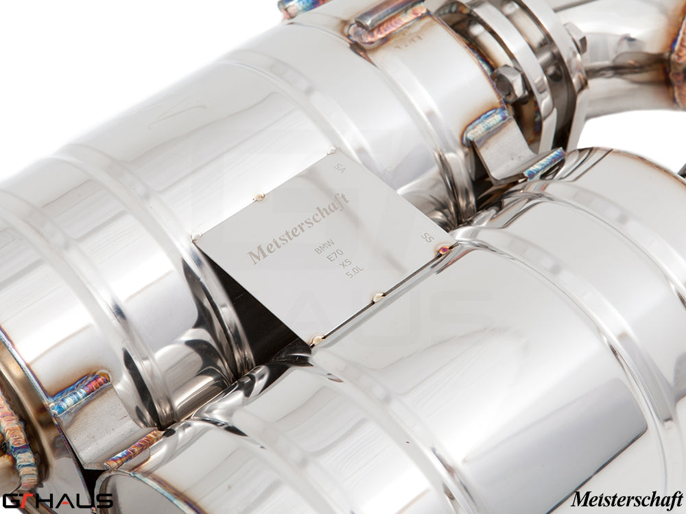 Premium stainless steel exhaust system for BMW E70 X5 5.0i, featuring Meisterschaft branding and precision craftsmanship.