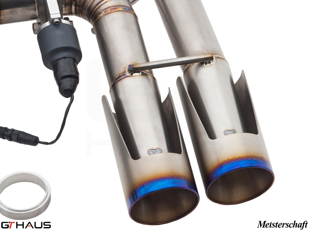 Premium exhaust tips for BMW E71 X6M featuring Meisterschaft branding and electronic valve control for enhanced performance.