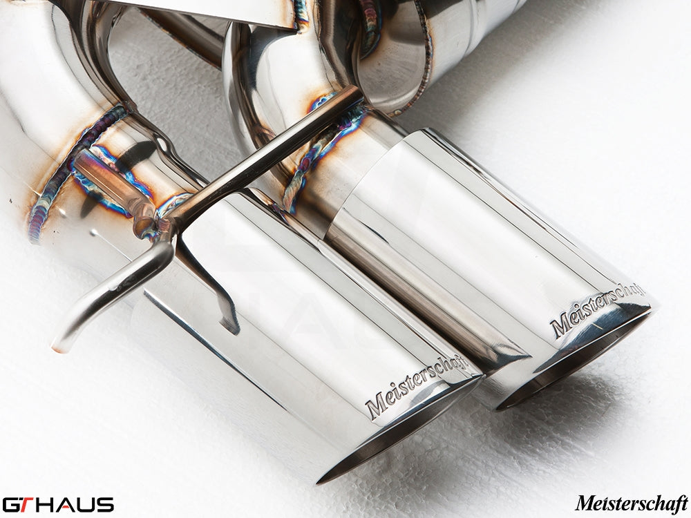 Premium Meisterschaft exhaust tips for BMW E82/88 1 Series 135i, showcasing high-quality stainless steel craftsmanship.