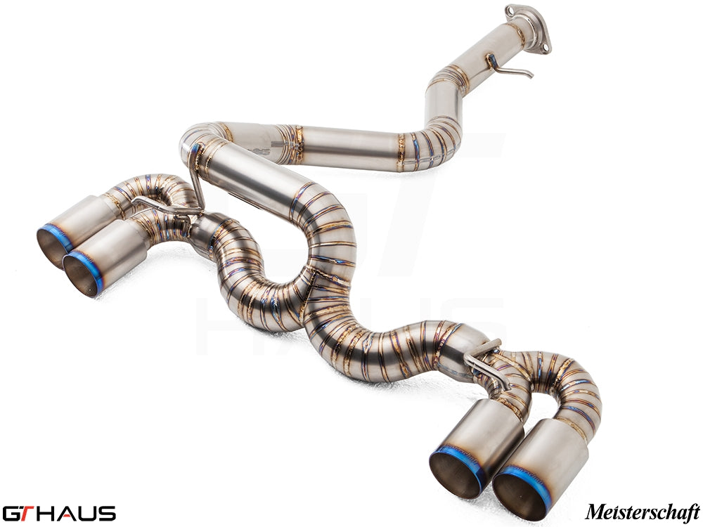 Premium performance exhaust system for BMW E82/88 1 Series 1M, featuring stainless steel construction and quad tips.