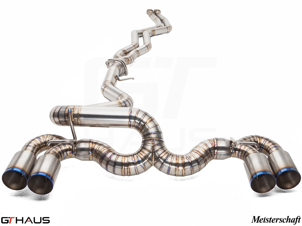 Premium performance exhaust system for BMW E82/88 1 Series 1M, featuring stainless steel construction and quad tips.
