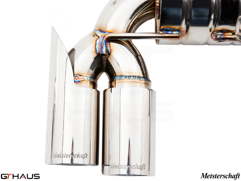 Premium stainless steel exhaust tip for BMW E90/92/93 M3, featuring Meisterschaft branding and precision welds.