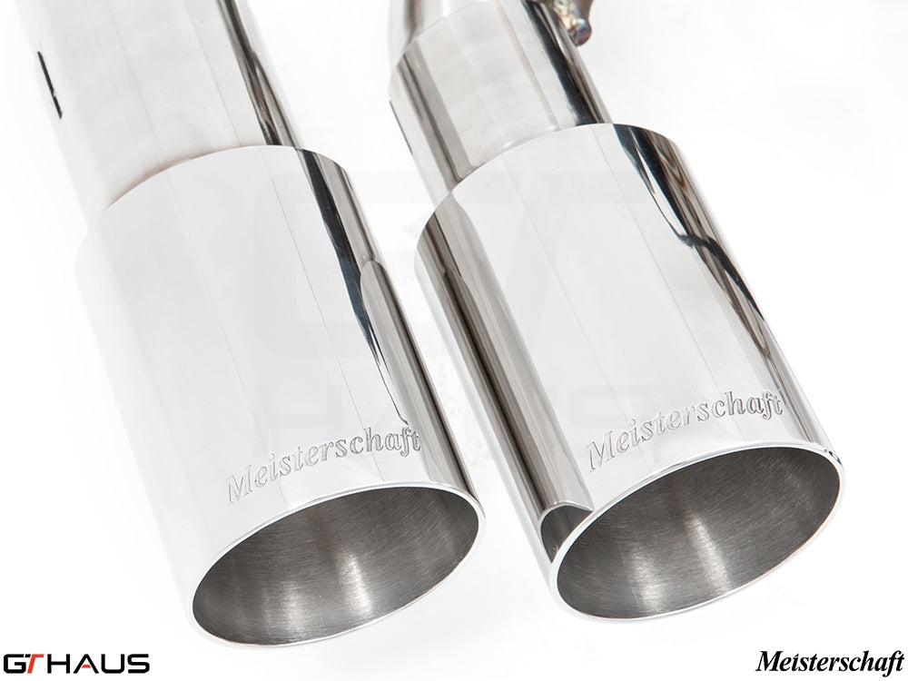 Polished stainless steel exhaust tips for BMW F32/F33 4 Series, featuring Meisterschaft branding for enhanced performance.