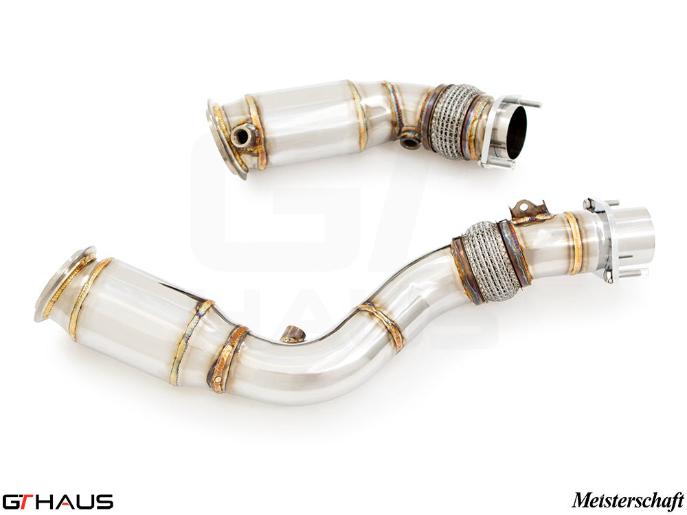 BMW F80/82/83 M3/M4 2014-2020 down pipes with 400 CEL sport cats and 90mm piping for enhanced performance.