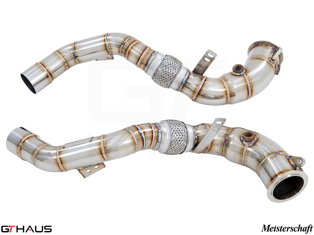 High-performance down pipes for BMW F85 X5M (2015-2019) featuring 90mm piping and 400 CEL sport cats.