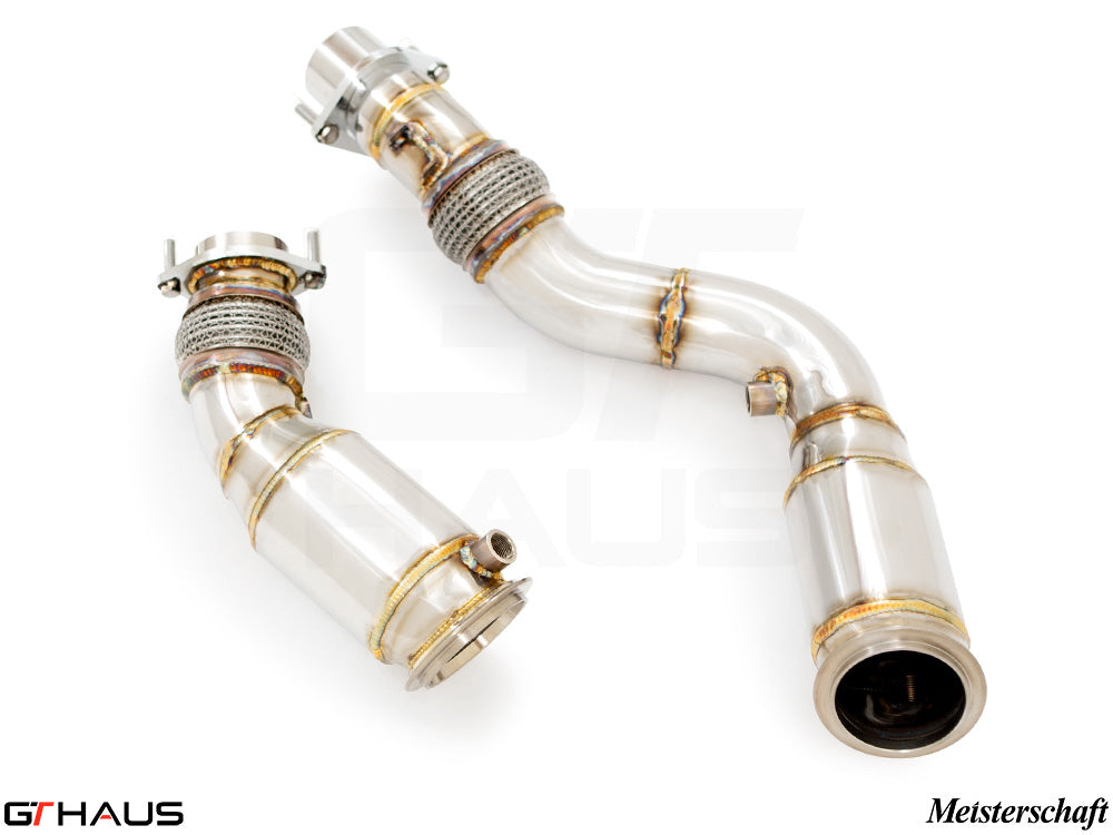 High-performance down pipes for BMW F87 M2 models, featuring 90mm piping and 400 CEL sport cats for enhanced exhaust flow.