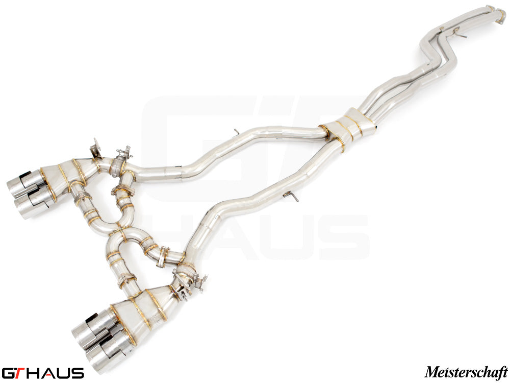 Premium performance exhaust system for BMW F87 M2 models, featuring stainless steel construction and quad tips.