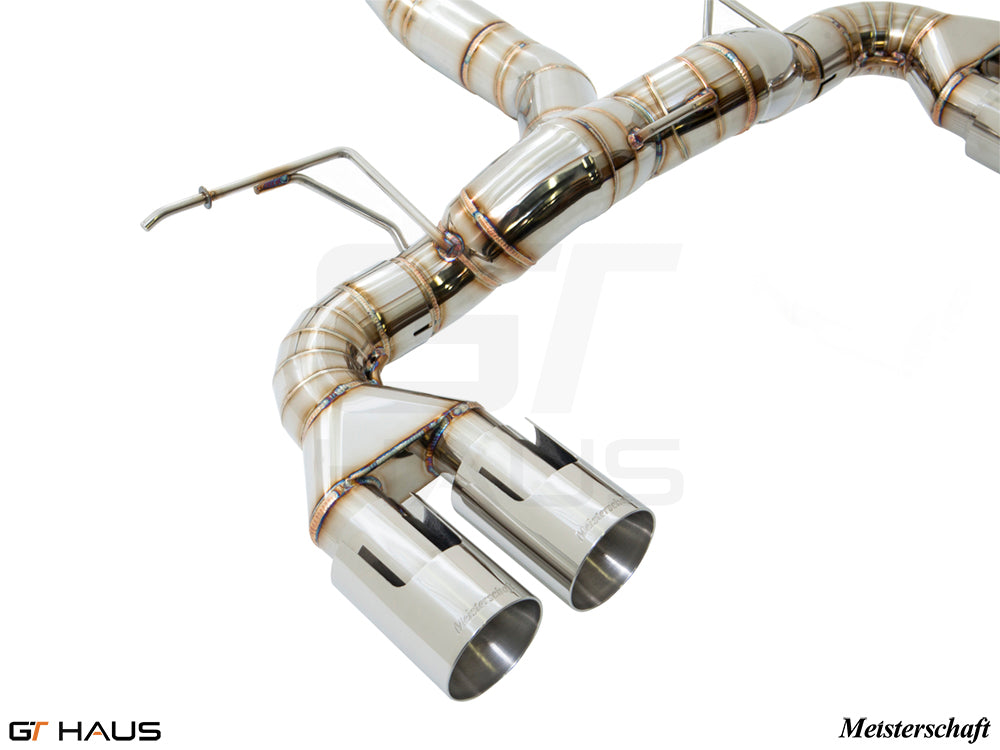 Premium performance exhaust system for BMW F87 M2 models, featuring stainless steel construction and dual tips.