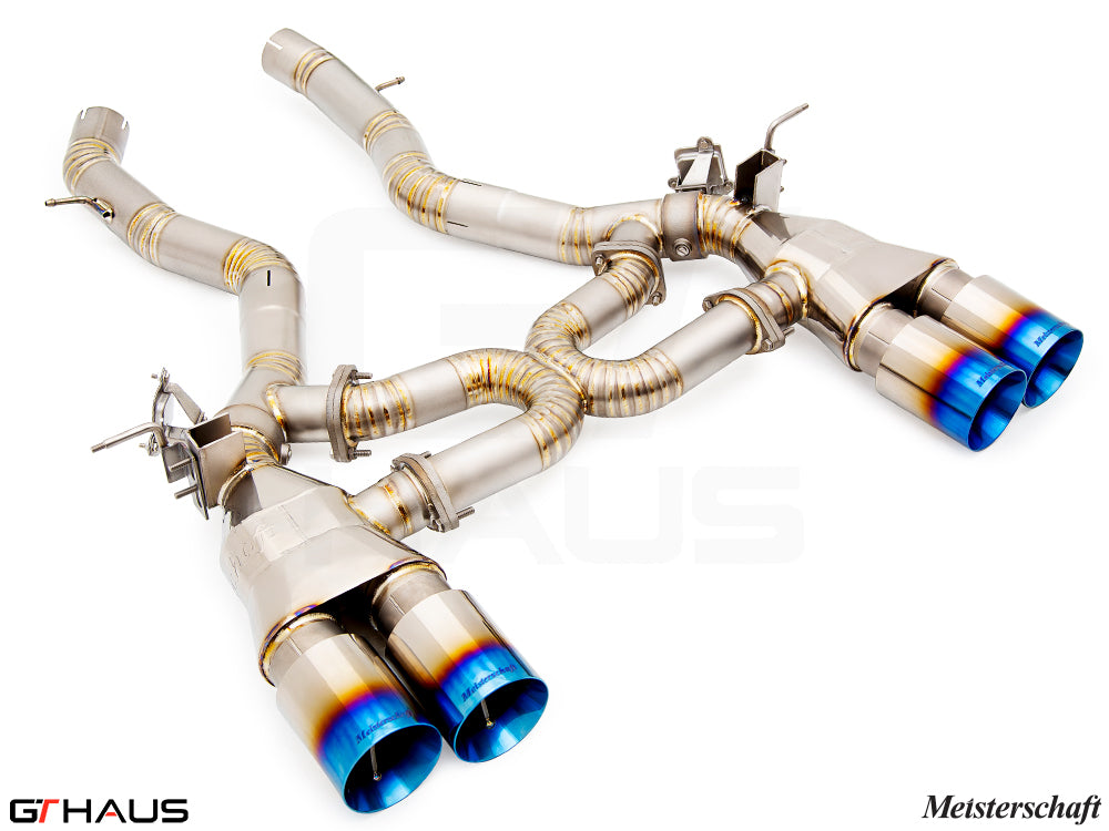 Premium performance exhaust system for BMW F87 M2 models, featuring stainless steel construction and vibrant blue tips.