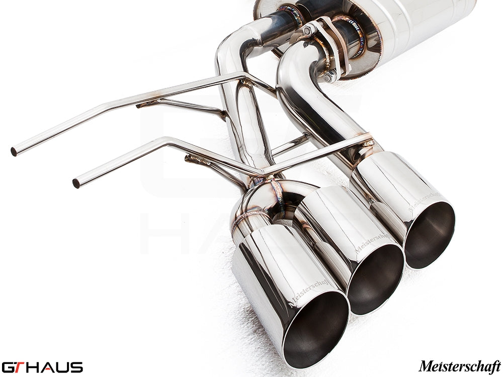 Premium exhaust system for Mercedes-Benz W463 G-Class G500/550 featuring polished triple tips and stainless steel construction.