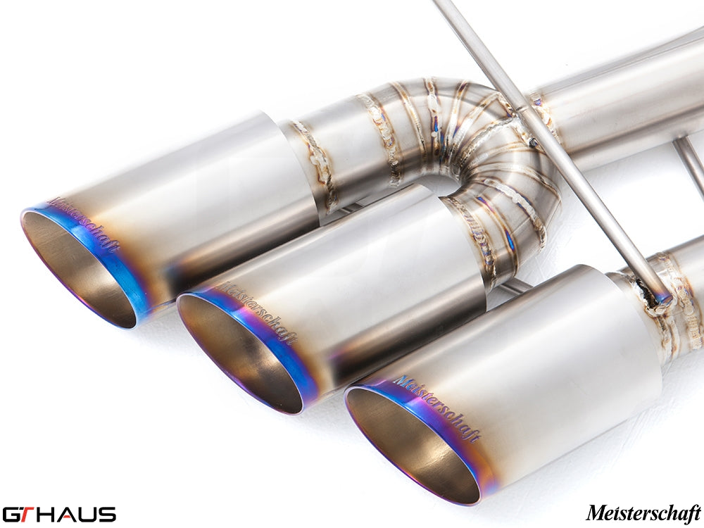 Premium stainless steel exhaust tips for Mercedes-Benz G55 AMG, featuring Meisterschaft branding and a polished finish.