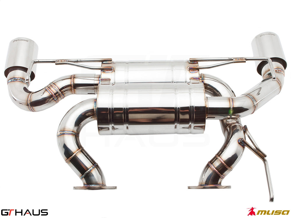 High-performance exhaust system for Nissan 370Z Nismo Edition, featuring polished stainless steel construction and dual tips.