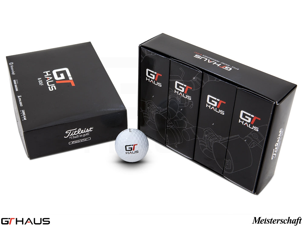 Custom personalized Titleist golf balls in a sleek GTHAUS box, showcasing premium quality and branding.