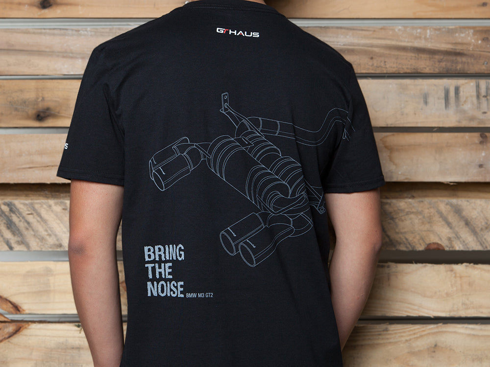 Black MEISTERSCHAFT T-shirt featuring a BMW M3 exhaust graphic and the phrase "BRING THE NOISE" on the back.